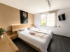 Schickes Reihenhaus mit zwei sonnigen Terrassen und Garten in familienfreundlicher Lage - Schlafzimmer OG