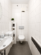 Schickes Reihenhaus mit zwei sonnigen Terrassen und Garten in familienfreundlicher Lage - Gäste-WC EG