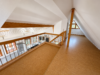Kernsanierte 3,5 - 4-Zimmer-Galeriewohnung mit EBK, Balkon und gemeinschaftlichem Garten - Galeriebereich
