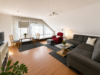 Großzügige 3,5-Zimmer-Dachgeschosswohnung mit EBK und Südbalkon in ruhiger Lage - Wohnbereich
