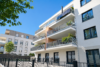 *Wohnkomfort auf höchstem Niveau* Neuwertige 4,5-Zimmer-Wohnung mit großem überdachtem Balkon - Gebäudeansicht