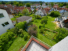 Schicke, renovierte 6-Zimmer-Maisonettewohnung m. Balkon u. Gemeinschaftsgarten in Aussichtslage - Blick in den Garten